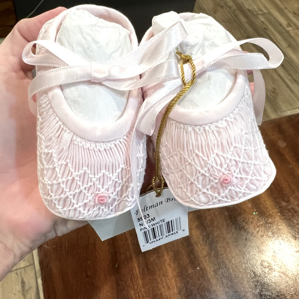 Feltman Brothers Booties. Never worn. Still has tags. 0-3 months.